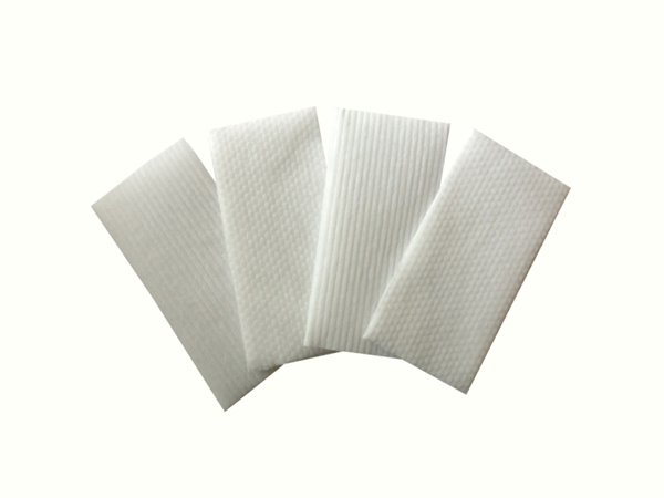 Embossed nonwoven